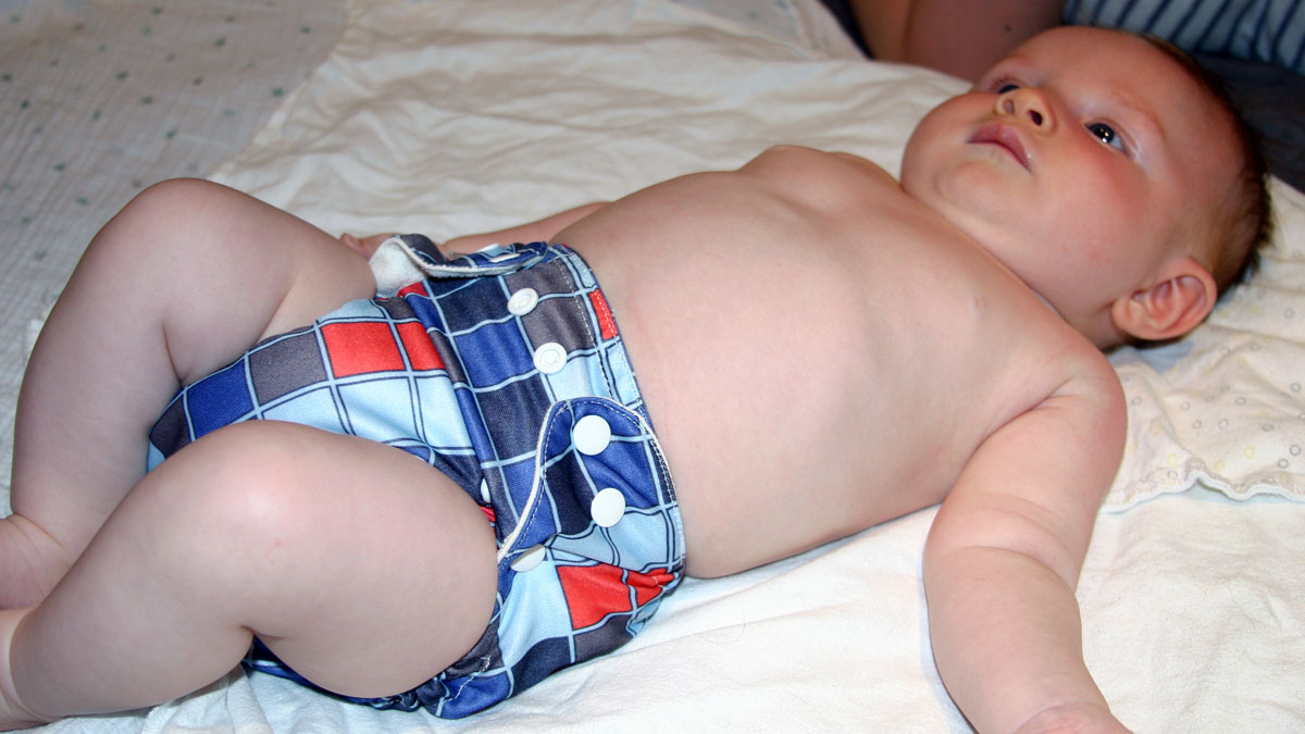 That Poore Baby looking stylish in cloth diapers