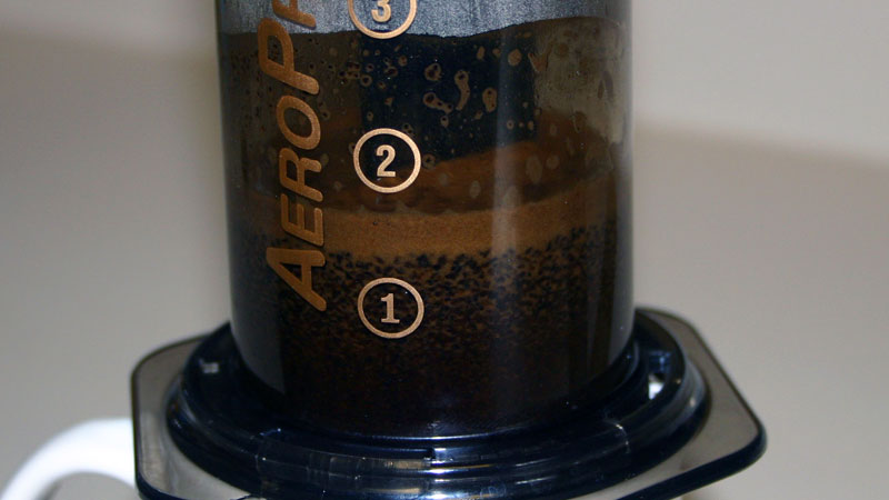 Slowly depress the plunger on the AeroPress